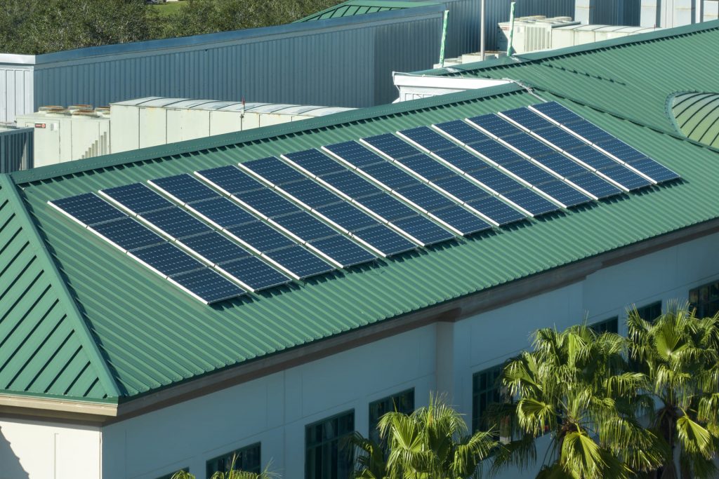 solar-panels-on-a-green-metal-roof