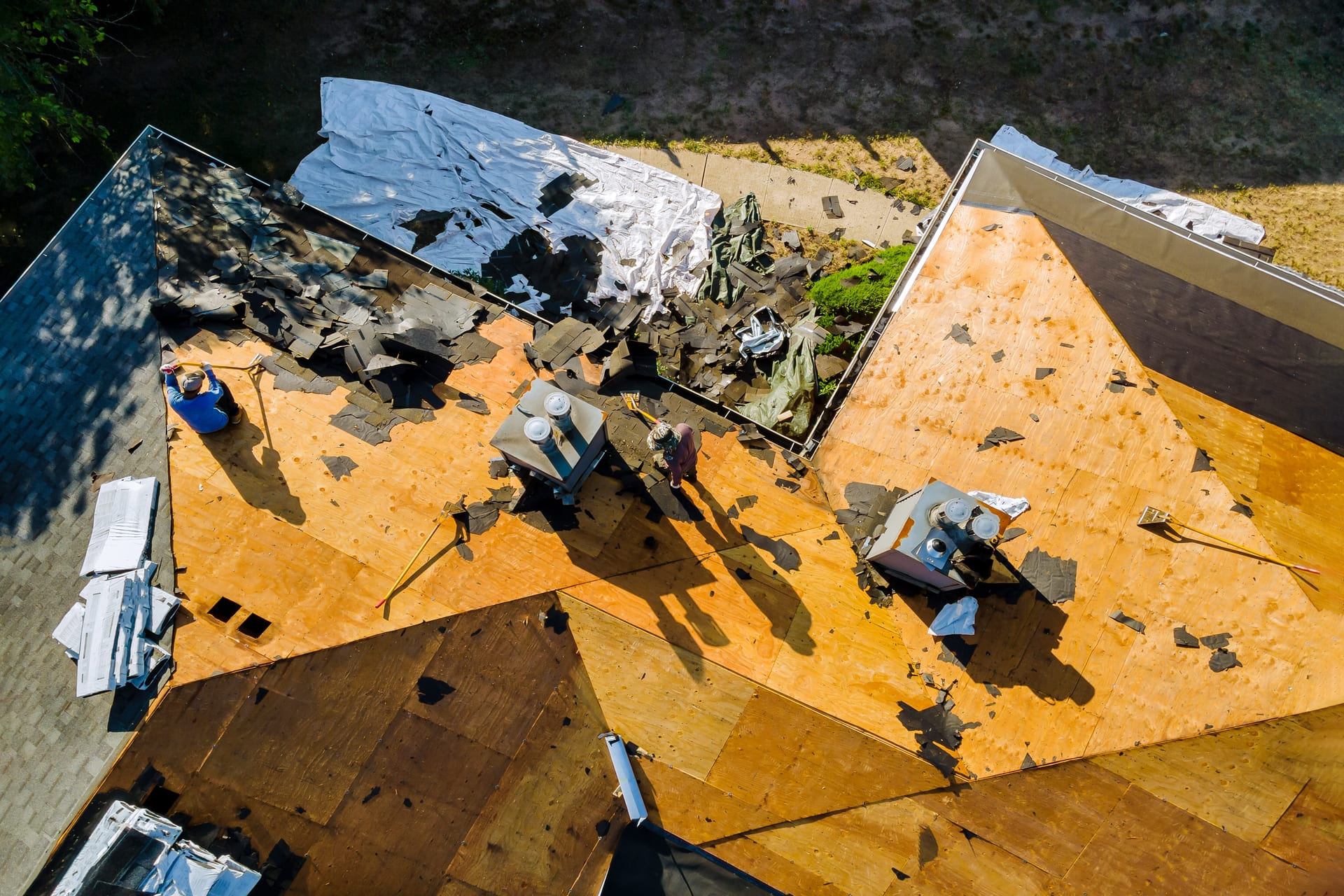 aerial-view-of-roof-under-repair-with-shingles-removed