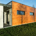 modern-single-story-house-with-wooden-cladding-and-large-windows