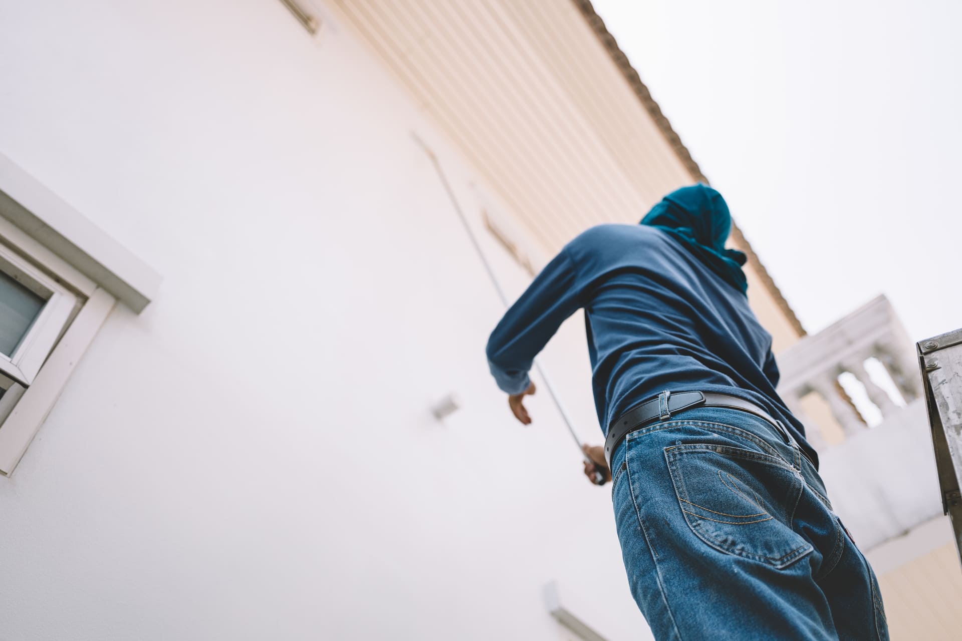 man-painting-white-wall